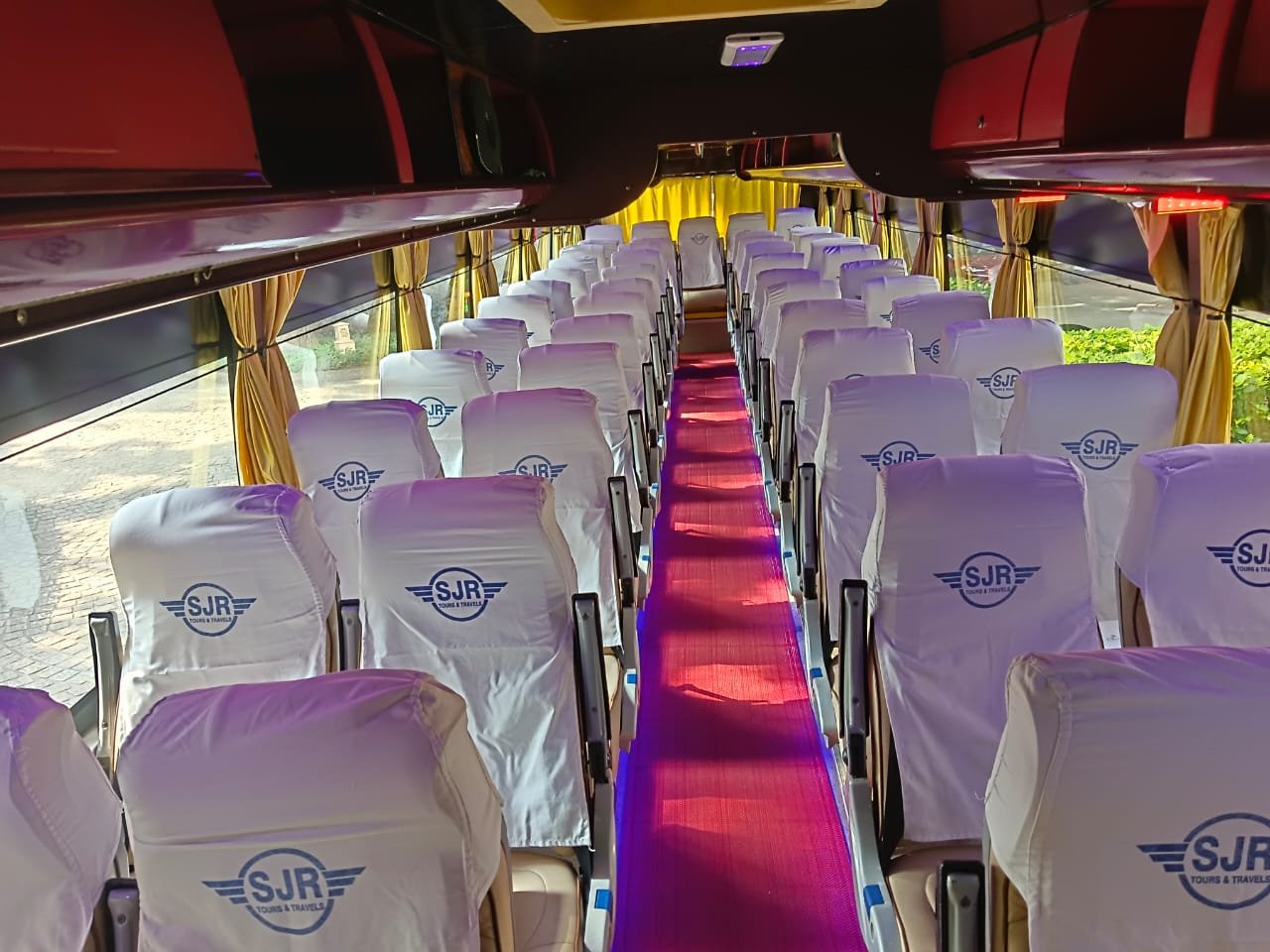 SJR Tours and Travels — luxury coach interior